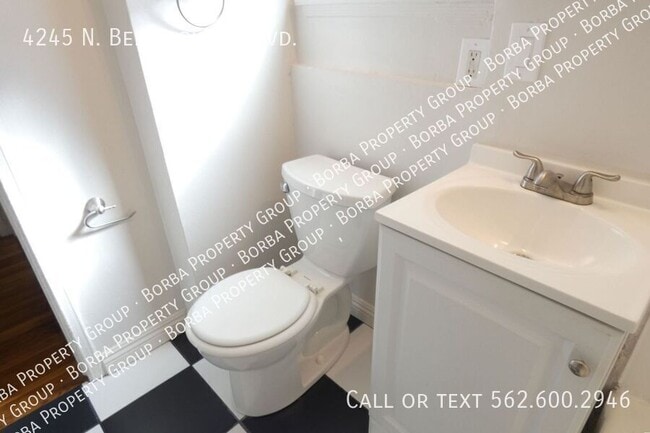 Building Photo - 4245 N Bellflower Blvd