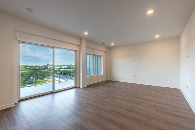 Building Photo - South Austin 2BR Condo with Balcony & Luxury Amenities
