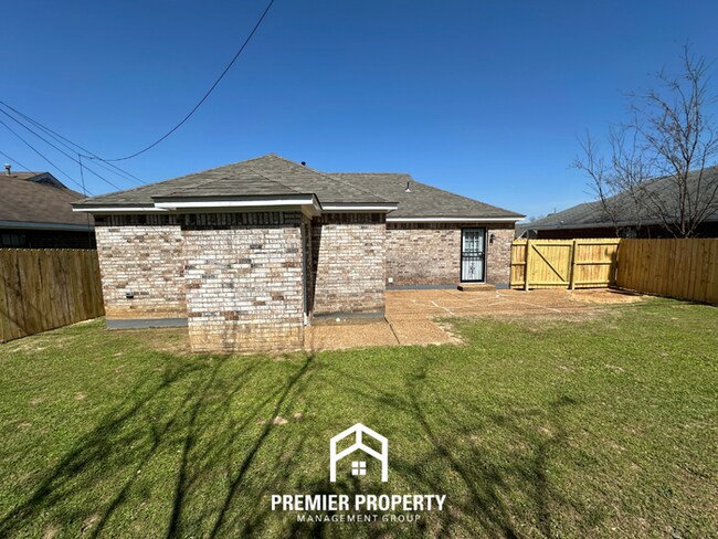 Building Photo - Spacious 4BR/2BA Home in 38141 | Vinyl Flooring & Large Fenced Backyard