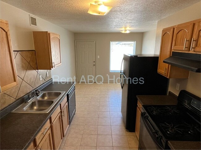 Building Photo - 9643 El Patron Rd SW