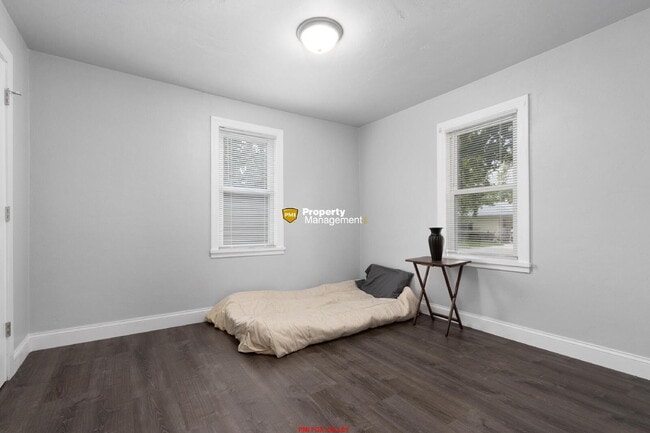 Building Photo - 4 bedroom home with 3 single car garges