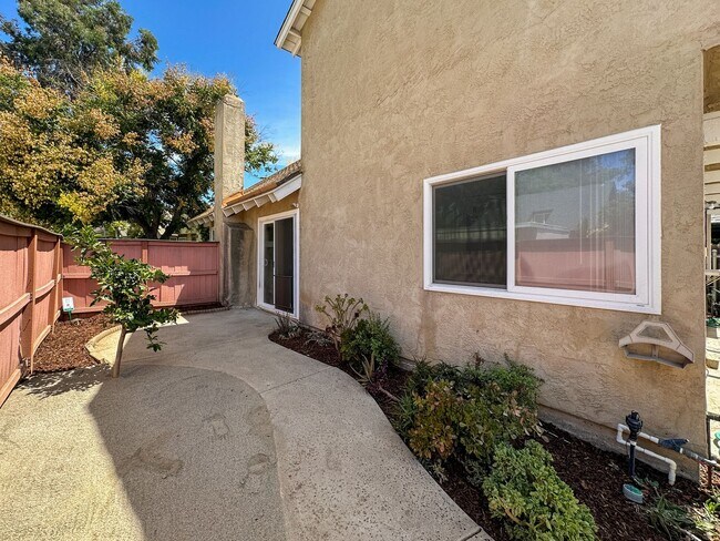 Building Photo - Updated 4 Bedroom, 2 Bath Villa Portofino ...