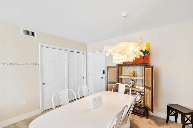 Building Photo - 5555 Collins Ave