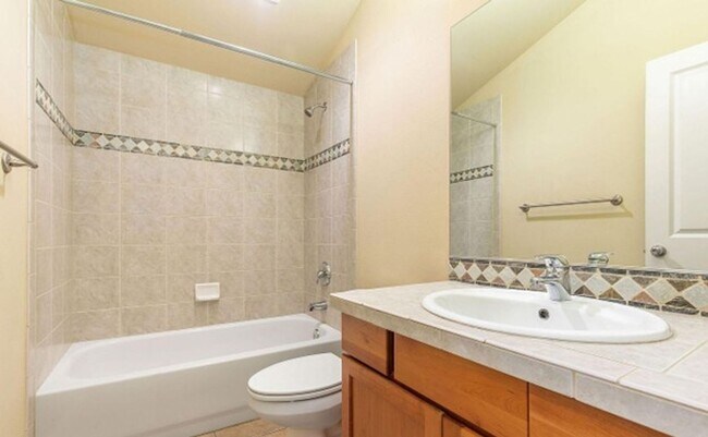 Building Photo - Energy-efficient townhome in the desirable community of Crown Hill is ready to be loved!