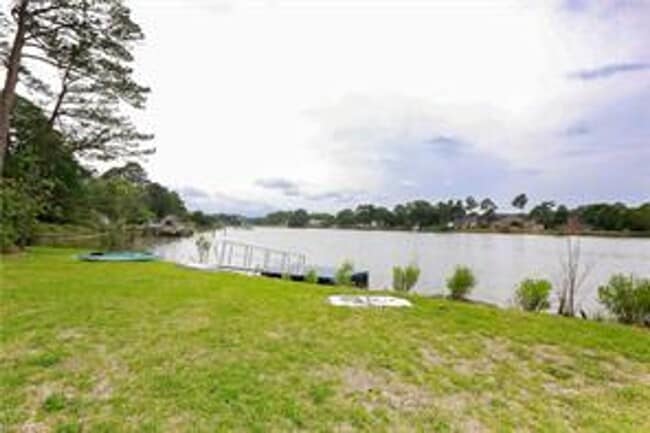 Building Photo - 4 BED/3 BATH LOCATED IN A WATERFRONT COMMU...