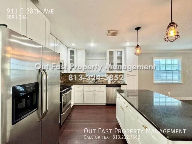 Building Photo - 911 E 28th Ave