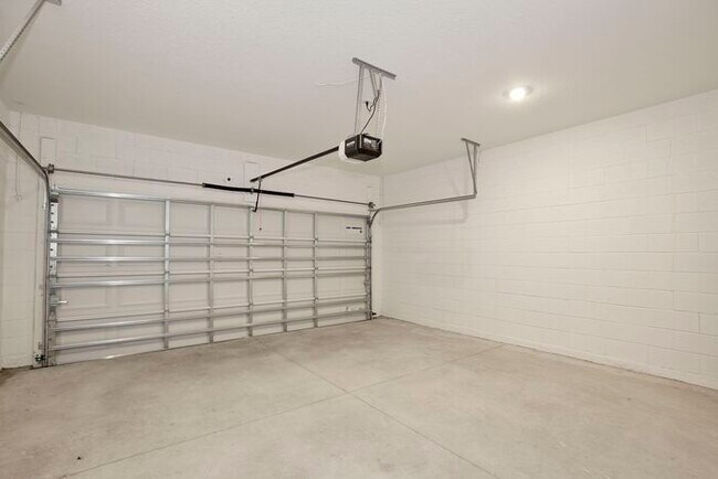 Building Photo - Stylish Sunbrooke Sanctuary! Modern 4/2 Ho...