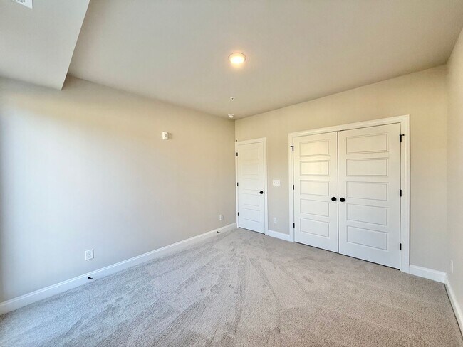 Building Photo - Stunning New Construction 2BD, 2.5BA Cary Townhome-Style Condo with a 1-Car Garage, EV Charging C...