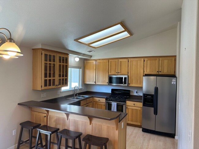 Building Photo - Sunny 3 Bedroom, 2 full bath w/Solar and B...