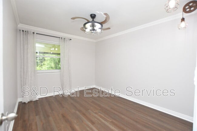 Building Photo - 8212 Riverboat Dr
