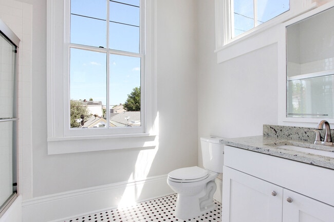 Building Photo - Spacious Uptown 2BR/2.5BA in Restored Mansion w/ GATED OFF STREET PARKING