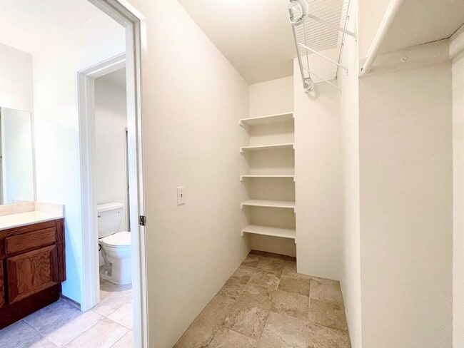 Building Photo - Upper Level Condo in The Villas of Calavera Hills!