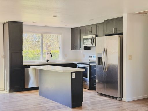 Building Photo - Charming 4BR Home with Huge Yard - W/D and Garage