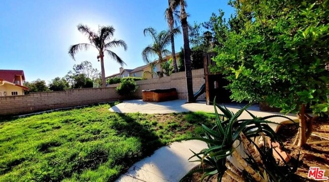 Building Photo - 15180 Carnation St