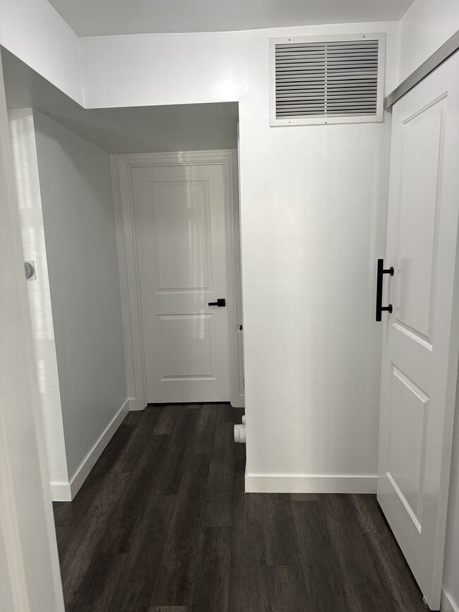 Hall way with closets - 10215 S Gramercy Pl