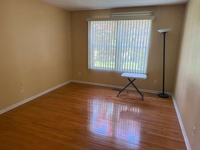 Building Photo - Large 2 Story home with 3 Bedrooms, 2.5 baths, hardwood floors, office and finished basement