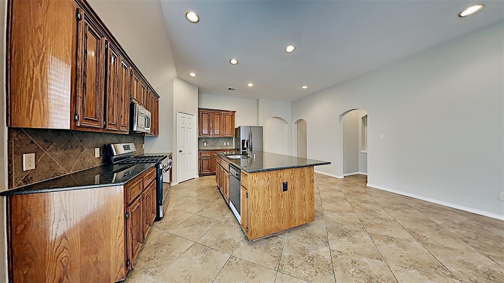 KITCHEN, WITH LARGE ISLAND SINK AND PANTRY CLOSET - 5623 Wagon Wheel Ln