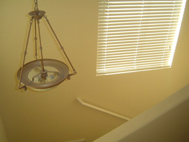 Building Photo - Move-In Ready Condo with Private Balcony & Modern Upgrades