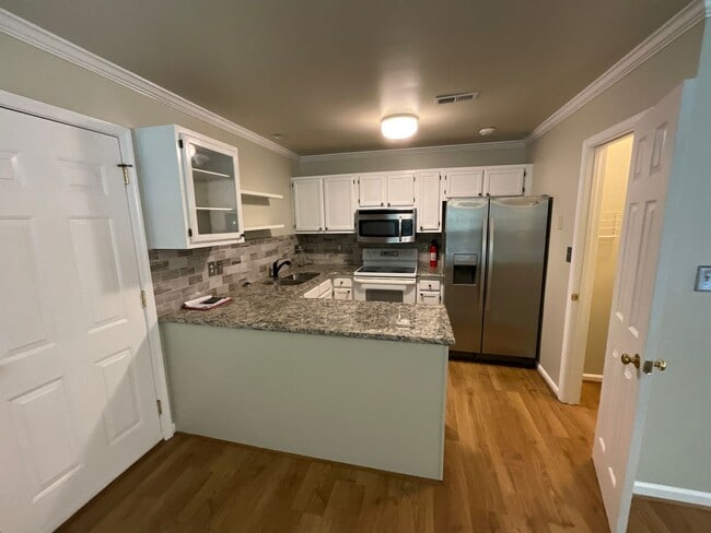 Building Photo - Now Available to View! Immaculate 2 bed, 2 bath, Fireplace, Garage, Granite and More!!