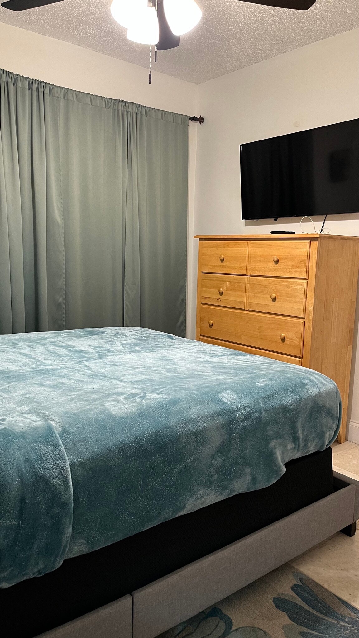 TV in guest bedroom - 19700 SW 103rd Ct