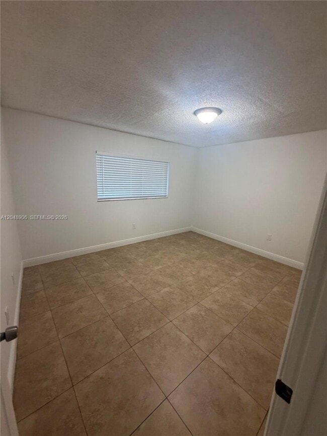 Building Photo - 1650 W 44th Pl