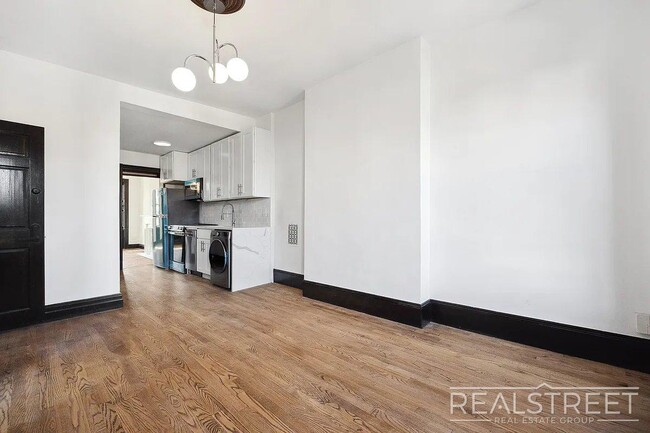 Building Photo - Timelessly Renovated Historic Triplex with...