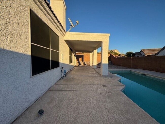 Building Photo - Pool Home with 3Bedrooms +Bonus Room Bullhead Parkway-Desert Foothills Estates- Can Be "Furnished...
