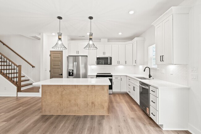 Building Photo - New Construction 3 Bedroom Townhome