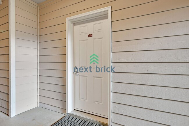 Building Photo - Rare Ground-Floor, End Unit with massive b...