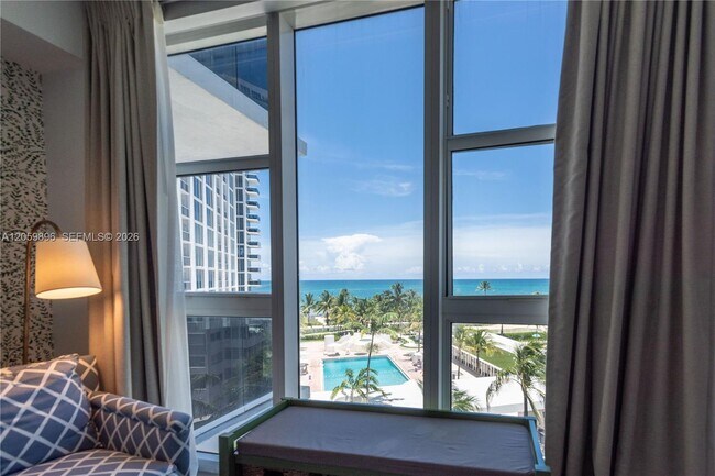 Building Photo - 10275 Collins Ave