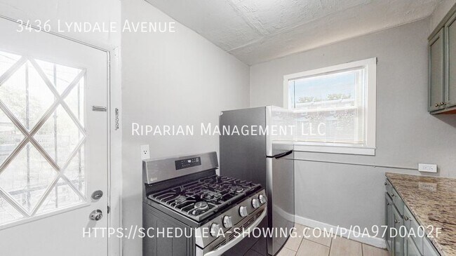 Building Photo - Fully Renovated & Fenced Backyard!