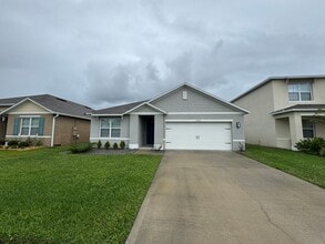 Building Photo - 3BD/2BA Modern Florida Home Living Reimagined — Solar-Powered Elegance Near I-95 in Edgewater! FU...