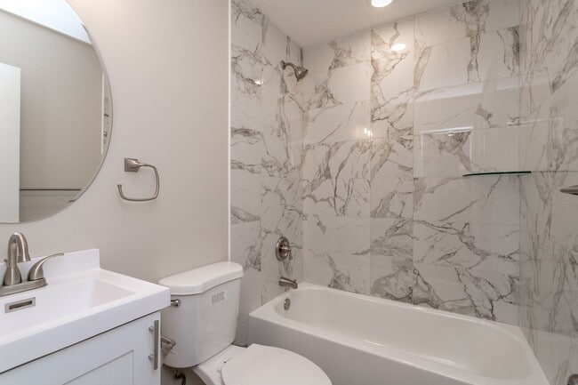 Building Photo - Introducing 303 Sanford: Your Energy-Efficient Haven of Modern Living with a Serene Backyard