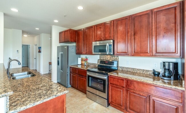 Building Photo - Beautiful Fully Furnished, 2 Bed, 2.5 Bath Kai Ani Village Townhome with Saltwater Pool