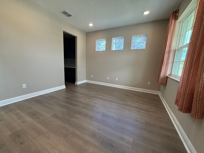 Building Photo - Brand-New 5BR/4BA Rental with Pond View, 4-Car Garage