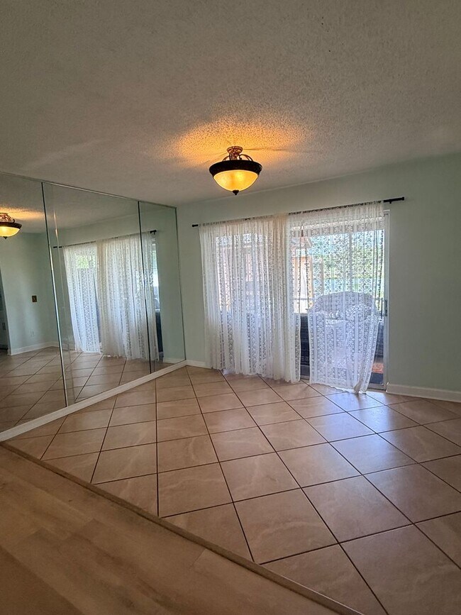 Building Photo - Beautifully Remodeled Lake Front Solar home. Call Sheila Campbell 407-687-7900