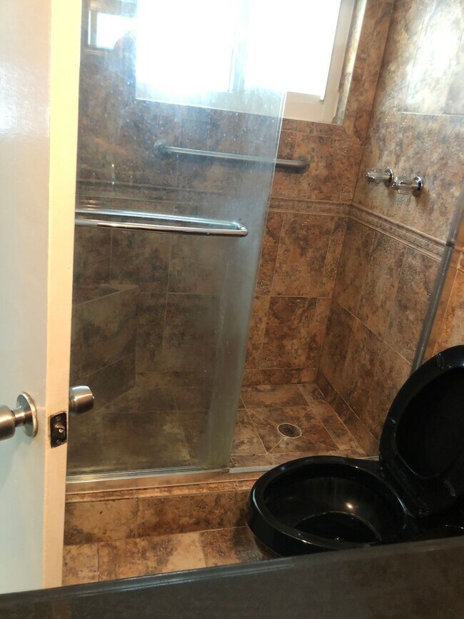 Building Photo - Large 3-2 with impact windows