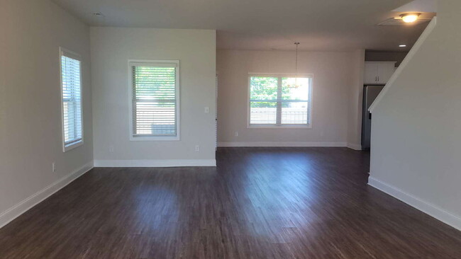 Building Photo - "Spacious 4-Bedroom Retreat with Modern Gr...