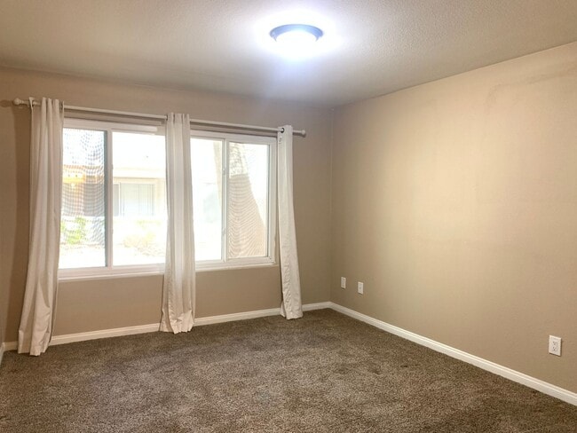 Building Photo - Thrive in this upgraded first-floor two be...