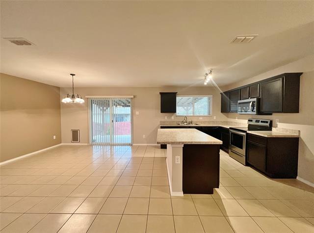 Building Photo - 9925 Amaryllis Ln