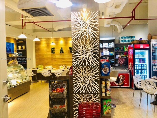 Building Photo - 10275 Collins Ave