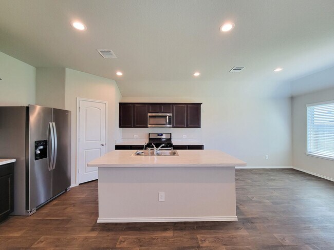 Building Photo - The price is right and the location is even better! Take a look TODAY at this like-new, 3/2, open...