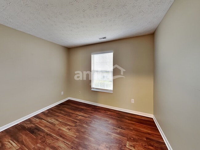 Building Photo - 8427 Nightshade Dr