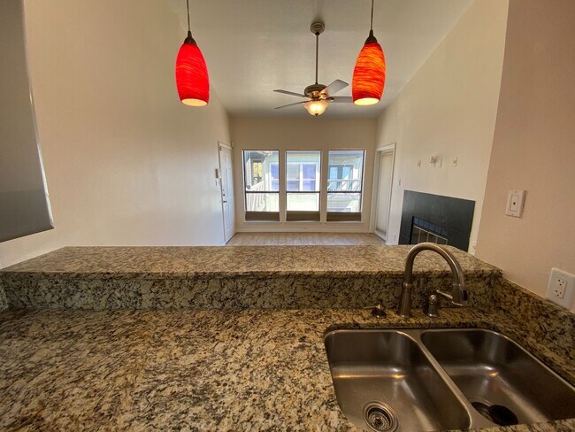 Building Photo - UT PRE-LEASE: 2 BR / 1 BA West Campus Condo - Walk to UT - Private Balcony - W/D