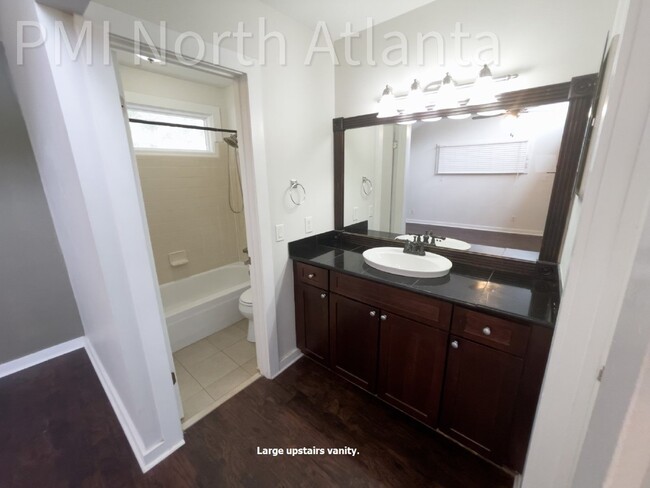 Building Photo - Pet Friendly End Unit!