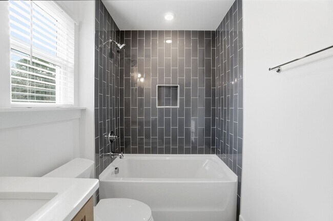 Building Photo - Bright & Modern New Construction Townhome