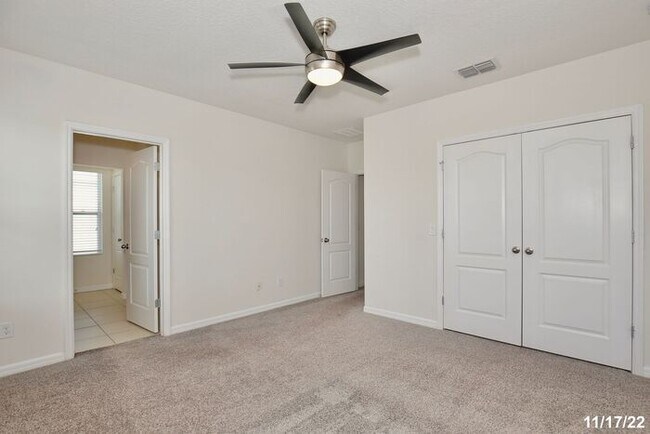 Building Photo - Spacious 3/2.5 Townhome with a 2 Car Garage and a Beautiful Pond View in Westwood Condos - Orlando!