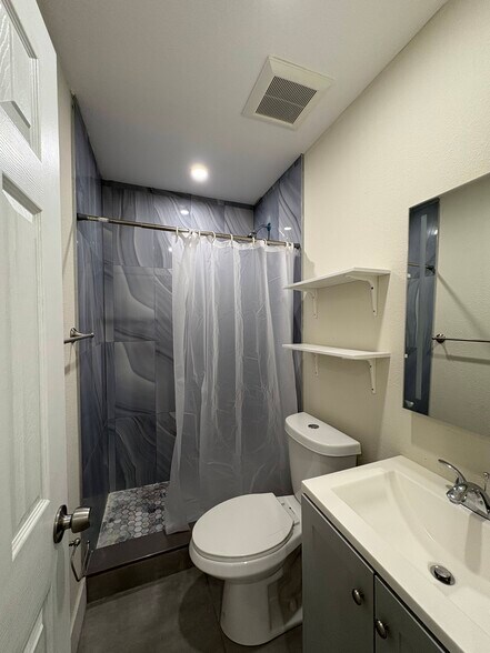 Full shower and vanity with cabinet space - 2385 SW 25th St
