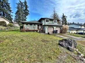 Building Photo - 1030 NE Coco Ct