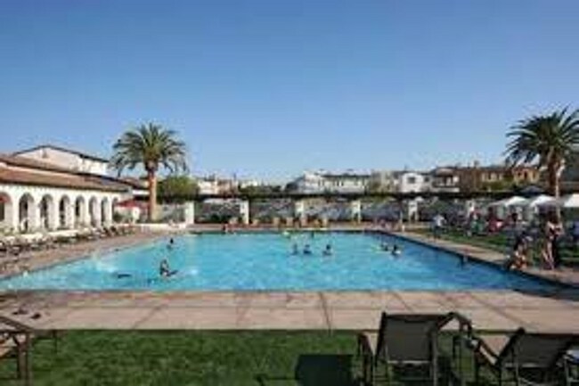 Building Photo - COASTAL LIVING IN A COUNTRY CLUB ENVIRONMENT.